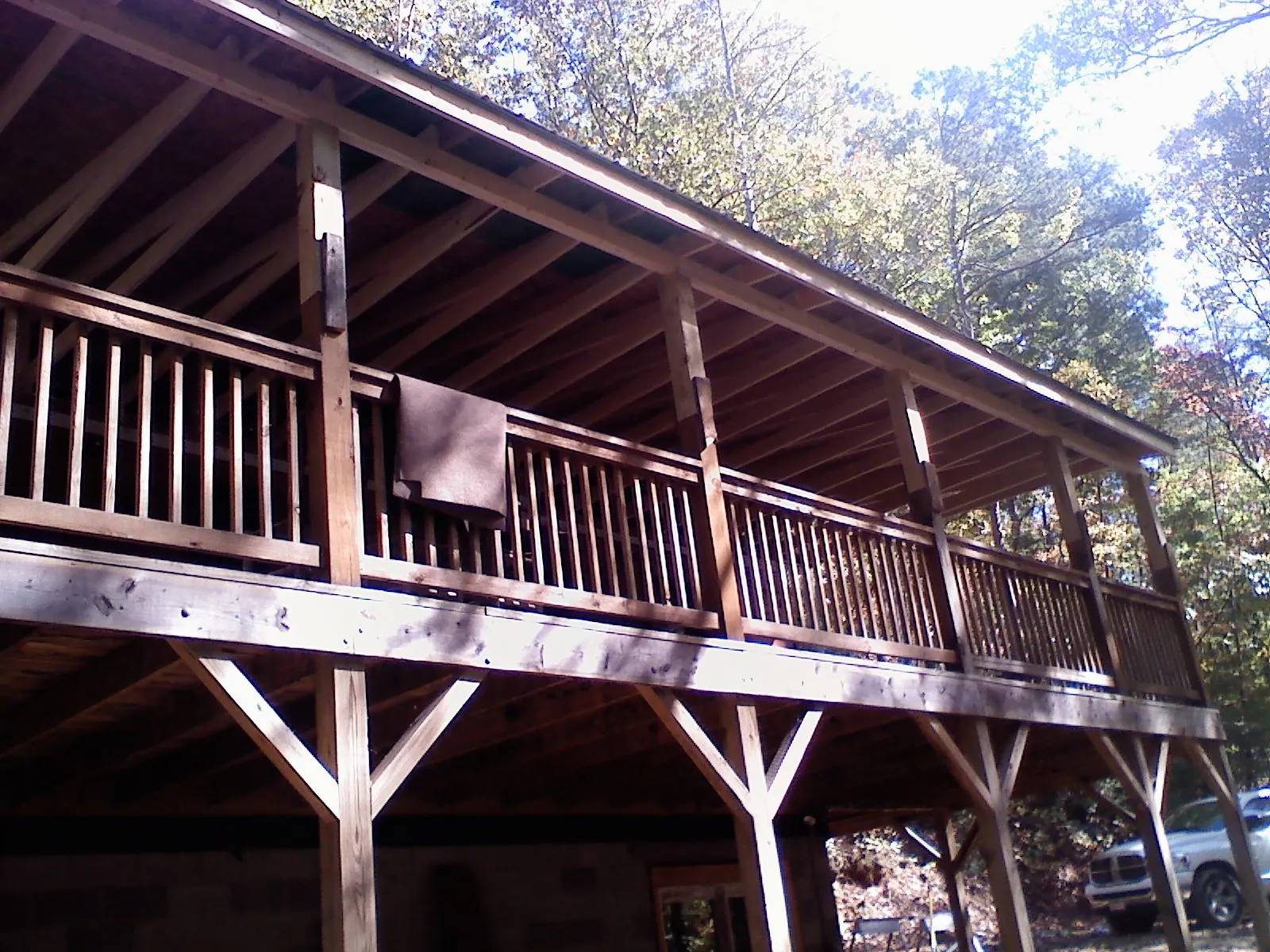 Timber framing under a new elevated porch and deck — Roof Leak Repair in Loretto by Roofing Brothers